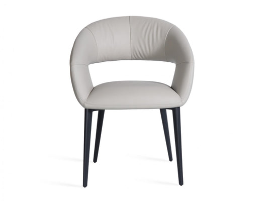 Front view of London Modern chair in beige with curved backrest and black legs on a white background